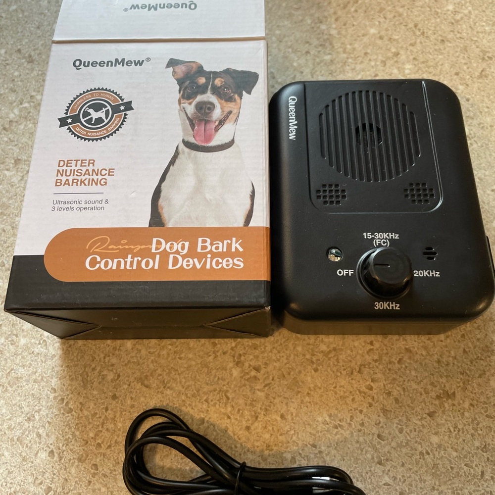 New in box dog bark control device